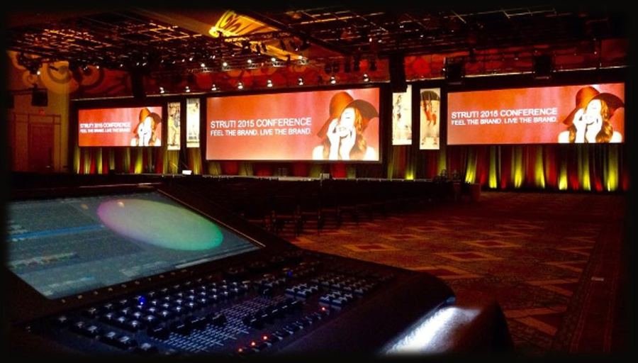 Branded conference stage with multi-screen display