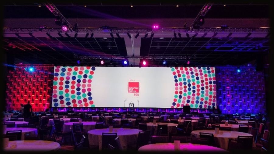 Corporate gala event with custom branded stage backdrop