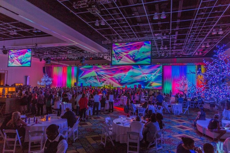 Branded social event with colorful custom projection and lighting design